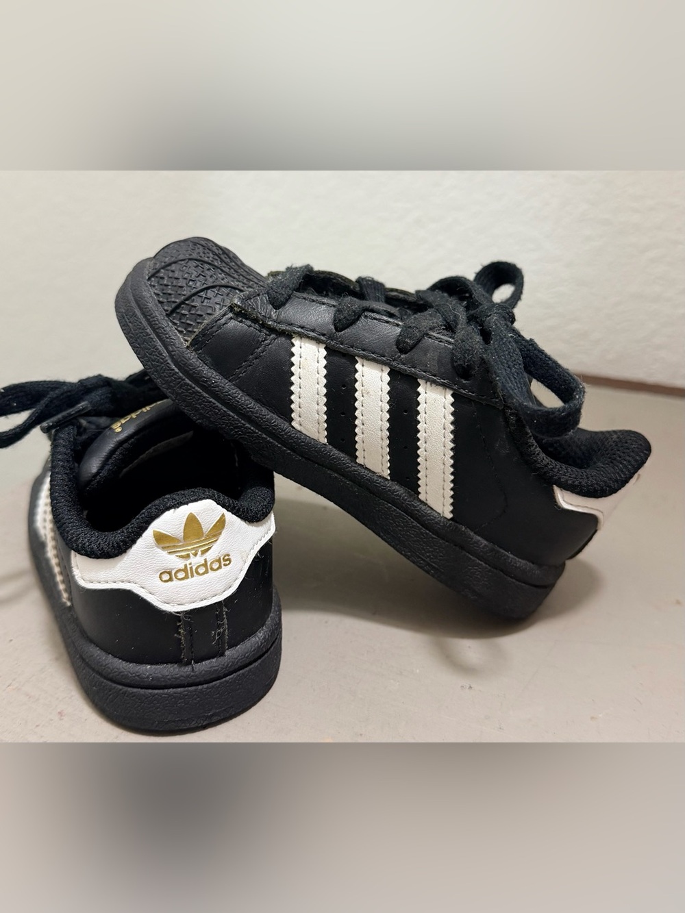 adidas Kids Black and White Three-Stripe Shell-Toe Sneakers